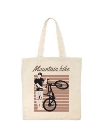 Ekotorba bawełniana w kolorze ecru. Czarno-brązowo-beżowy nadruk kolarza trzymającego rower MTB oraz napis Mountain Bike.